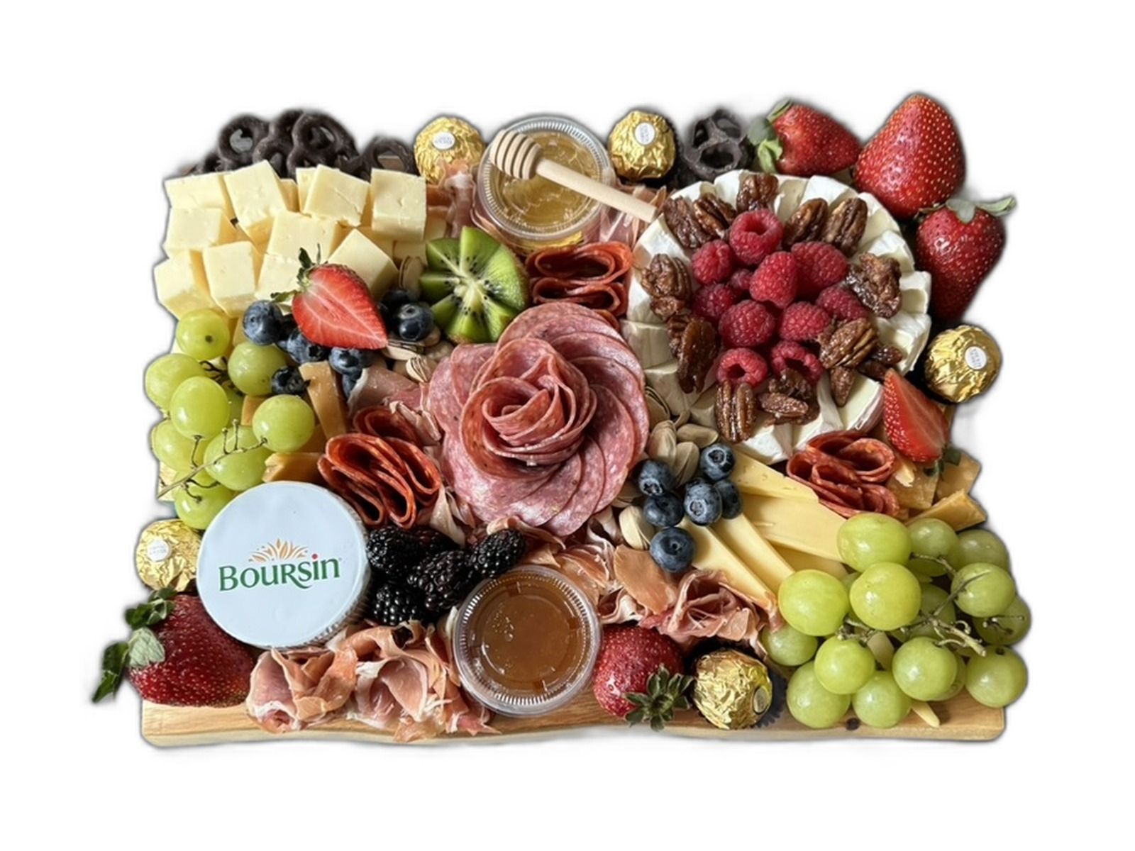 Charcuterie and fruit gifting board with meats, cheeses, berries, nuts, and Boursin